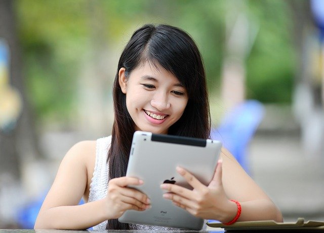 woman planning event on ipad