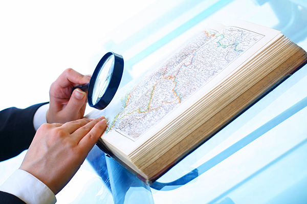 magnifying glass on a map